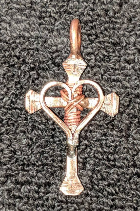 Copper cross with heart